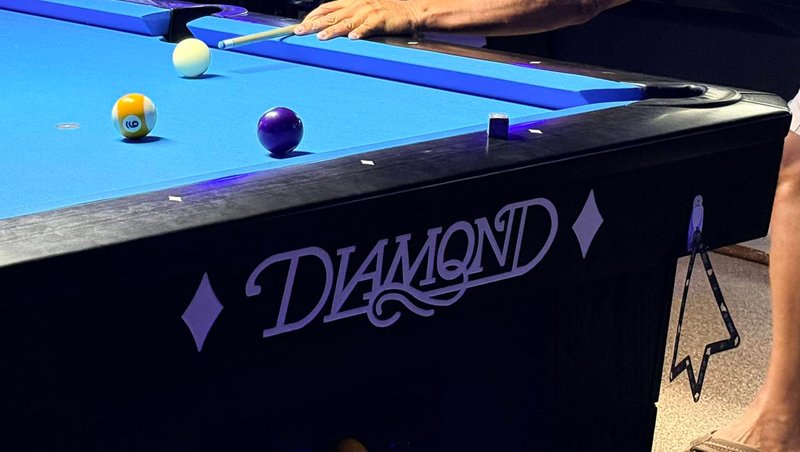 Diamond pool table with blue cloth